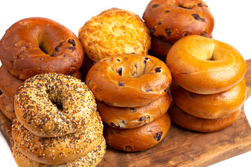 Variety of Bagel Flavors on a Cutting Board