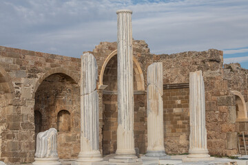 Fototapeta premium An antique ruined city of columns.Ruin. View of the ancient city in Side, Turkey.