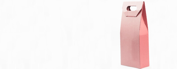 paper bag on a white background. eco packaging concept. product packaging layout. illustration of shopping in the market.craft beige bag on a light texture. cardboard box with space for an inscription