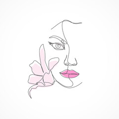 Continuous woman face line art with flower