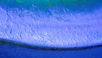 Naklejka premium Beautiful bright colorful street art graffiti background. Abstract creative spray drawing fashion colors on the walls of the city. Urban Culture gradient texture, copyspace backdrop