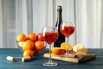 Concept of alcohol drink with Sangria on wooden table