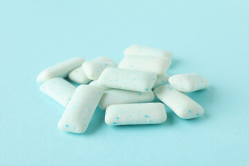 Chewing or bubble gum on blue background