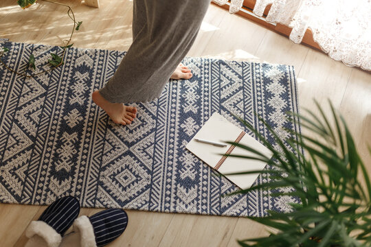 Close Up Of Female Feet Getting Out Of Bed In The Morning. Wake Up Woman - Image Woman Legs In Bedroom Walking To Window On Carpet Floor,rear View.