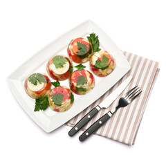 Portion of delicious chicken aspic on a plate isolated on white background