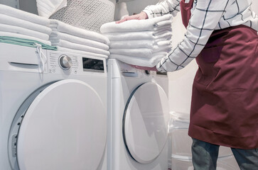 wash dry towel worker laundry washing machine hotel