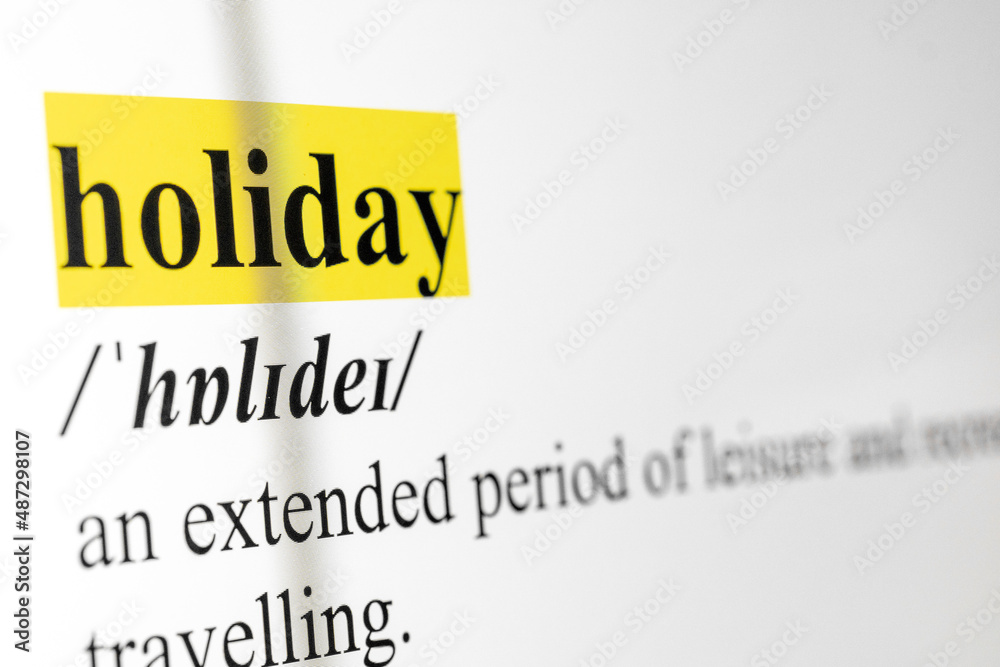 Poster holiday text macro shot highlighted in yellow color on computer screen