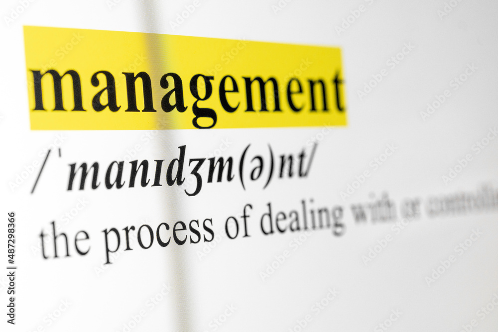 Poster Management Text Macro Shot Highlighted in Yellow Color On Computer Screen