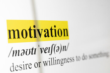 Motivation Text Macro Shot Highlighted in Yellow Color On Computer Screen