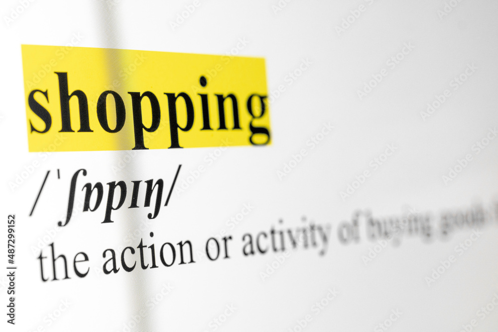Poster shopping text macro shot highlighted in yellow color on computer screen