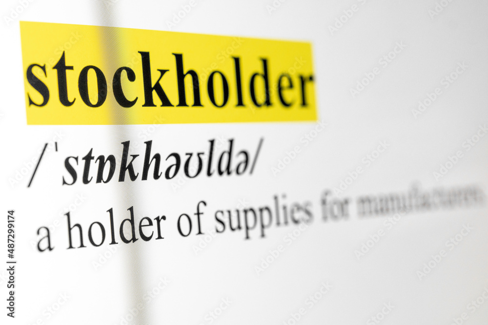 Fototapete stockholder text macro shot highlighted in yellow color on computer screen