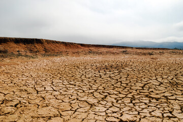 Crater from exploded cluster bomb with dried soil in Xieng Khouang Province, Laos. One of the most heavily bombed place in Laos. © Nadezhda Zaitceva