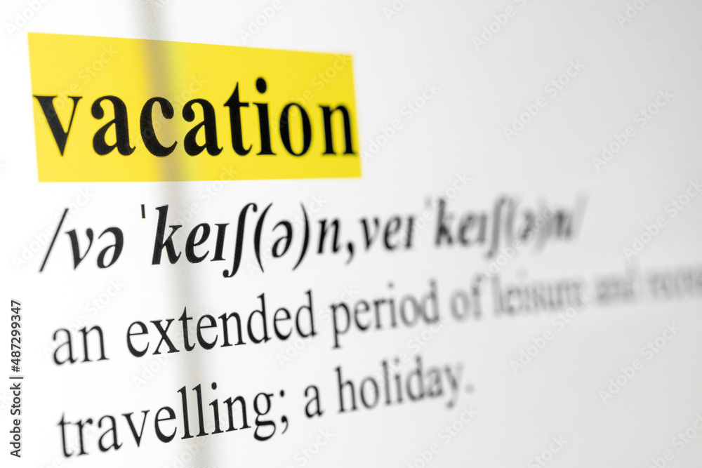 Fototapete vacation text macro shot highlighted in yellow color on computer screen