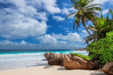 Tropical Sunny beach on exotic Seychelles island. Summer vacation and tropical beach concept.	
