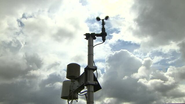 Anemometer at the weather station. Monitoring weather conditions. Strong wind before the storm.