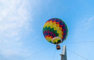 aerial view of colorful hot air balloons flying over Ho Chi Minh city, Vietnam