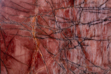 New quartzite background in dark red tone as part of your design.