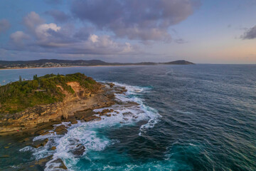 Aerial Sunrise Seascape at Rocky Inlet with clouds