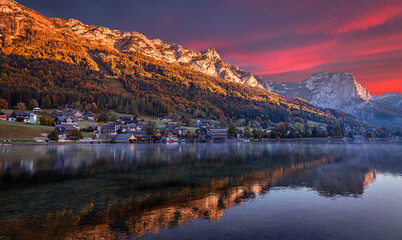 Impressively beautiful Fairy-tale mountain lake in Austrian Alps. Breathtaking Scene during sunset....