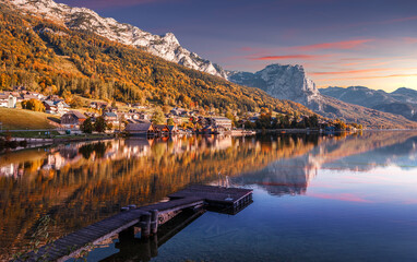 Amazing mountain landscapes with fairy-tale lake during sunset in Grundlsee village. Austrian Alps, Europe