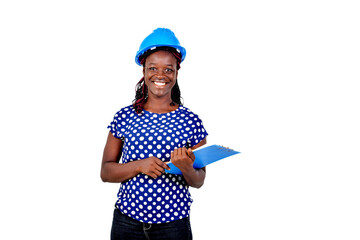 young female construction engineer smiling at clipboard.