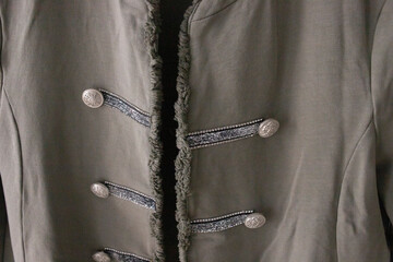 Detalle de chaqueta de botones