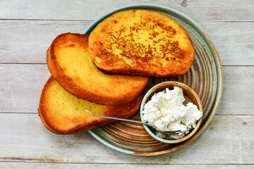 French toast  and white cheese. Rustic breakfast  made from deep fried   bread   with organic free range   eggs