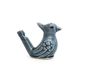 Porcelain whistle form bird, children toy on white background.
