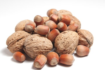a handful of nuts on a white background