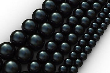 Black pearls necklaces. Black cultured tahitian pearls of three different sizes in two-thread necklaces on a white background, close-up, 3D illustration.