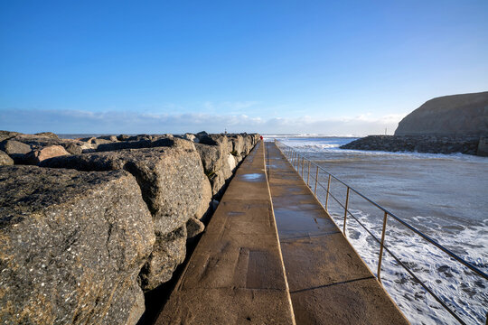 Staithes seaside town and sea defenses in North Yorkshire