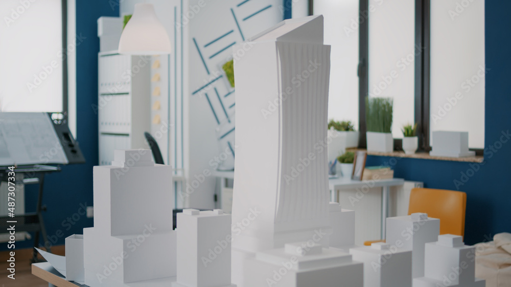 Poster close up of building model and maquette design on table to create urban structure. construction layo