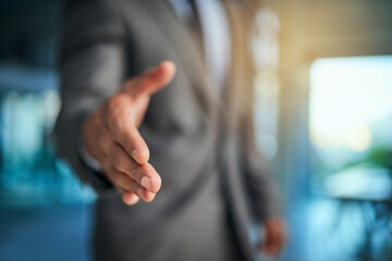 Pleased to make your acquaintance. Cropped shot of a businessman extending his arm for a handshake.