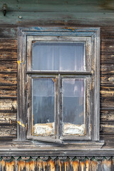 Fototapeta na wymiar the window of an abandoned house