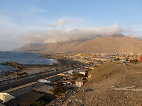 Photograph taken on a sunny day around Atacama desert region at Chili, showing the architecture and colours of this historical place. Rocks formation, lagoons, fauna and geysers.