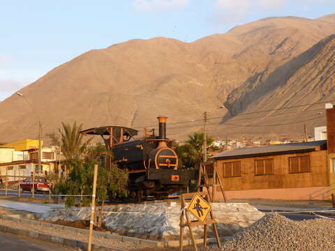 Photograph taken on a sunny day around Atacama desert region at Chili, showing the architecture and colours of this historical place. Rocks formation, lagoons, fauna and geysers.