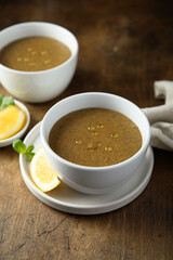 Traditional homemade lentil soup with lemon