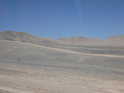 Photograph taken on a sunny day around Atacama desert region at Chili, showing the architecture and colours of this historical place. Rocks formation, lagoons, fauna and geysers.