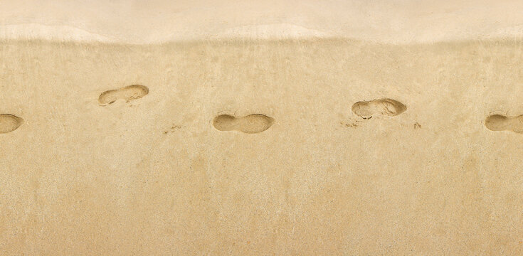 Footprints in  sand, footprints on shore. Seamless texture. Pattern. Traces of shoes on sandy shore	