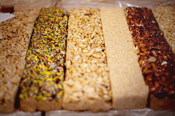 handful  of oriental sweets on the market in the old town - obrazy, fototapety, plakaty