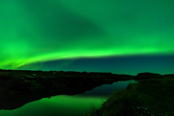 Fototapeta na wymiar Aurora borealis lights long exposure with star trail