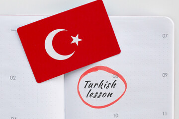 calendar planner notebook with date inscription turkish lesson marked and circled with marker,...