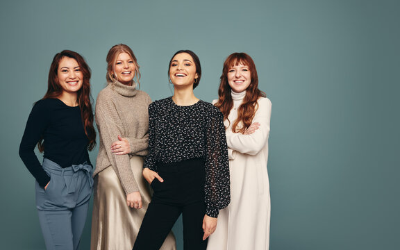 Diverse women smiling cheerfully in a studio