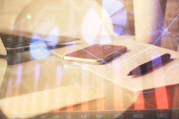 Double exposure of forex graph drawing and cell phone background. Concept of financial data analysis