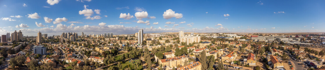 Fototapeta na wymiar The 180 degree panoramic view on buildings in Beer Sheva city at winter