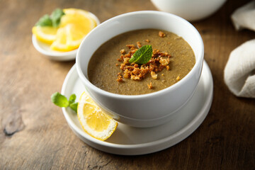 Traditional homemade lentil soup with lemon