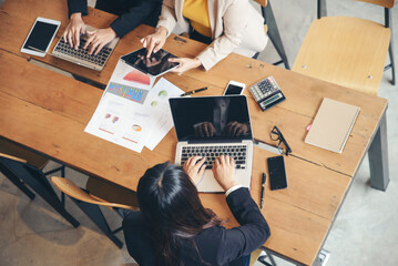 Brainstorming meeting to plan Strategy Business Concept. Collaborate team and Planning between Professional Businessman and Partnership. Group of Business people using laptop and teblet.