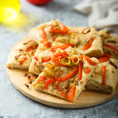 Traditional homemade focaccia bread with red pepper