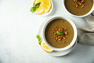 Traditional homemade lentil soup with lemon