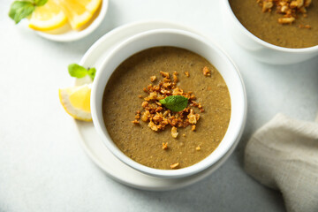 Traditional homemade lentil soup with lemon